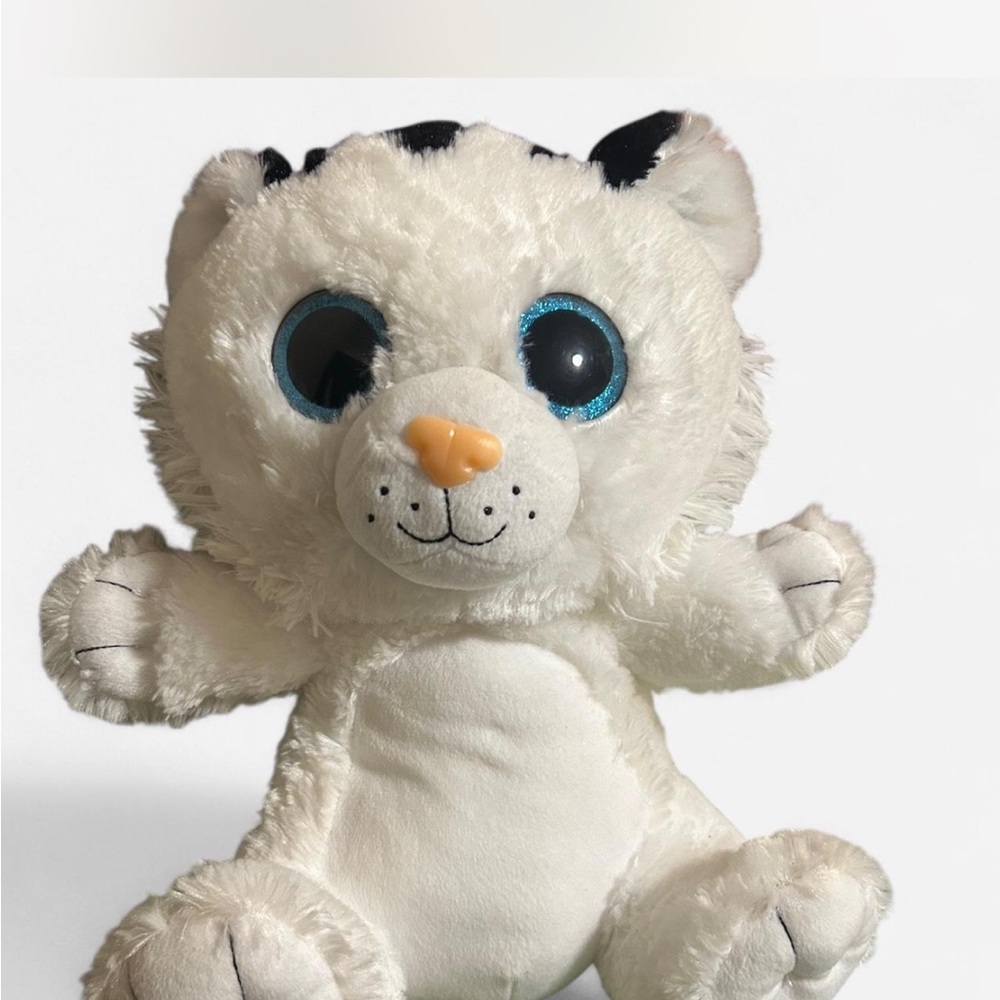 White and Black Stuffed Animal Toy